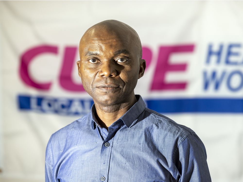 bashir jalloh, president of cupe local 5430, inside his regina office on march 14, 2022.