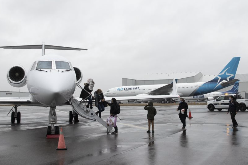 Children and their caregivers from Ukraine arrive in Toronto to be cared for at Sick Kids hospital on Wednesday, March 23, 2022.