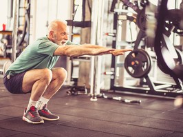 Senior man exercising at the gym