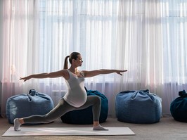 Pregnant woman practice yoga