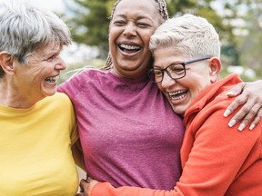 Multiracial senior women having fun together after sport workout outdoor