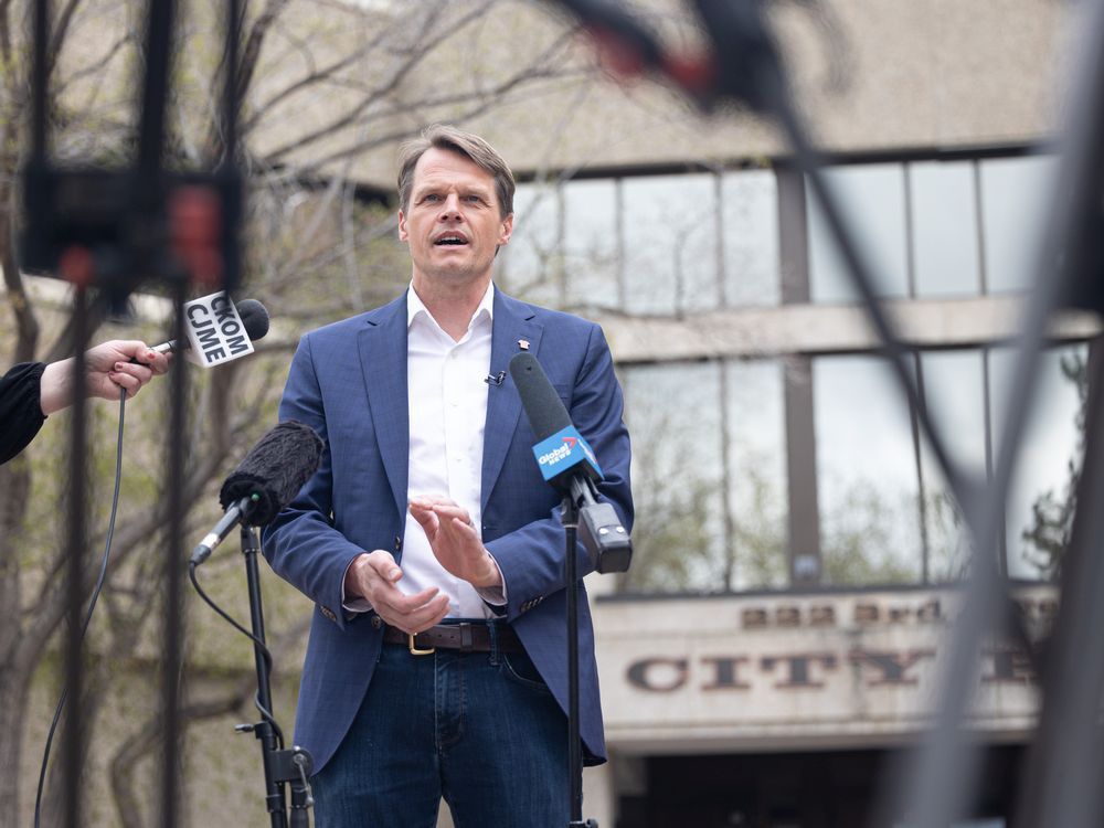 Saskatoon Mayor Charlie Clark holds a press conference in front of City Hall about the provincial government introducing legislative amendments this week to allow cities to decide whether to allow alcohol consumption in parks.