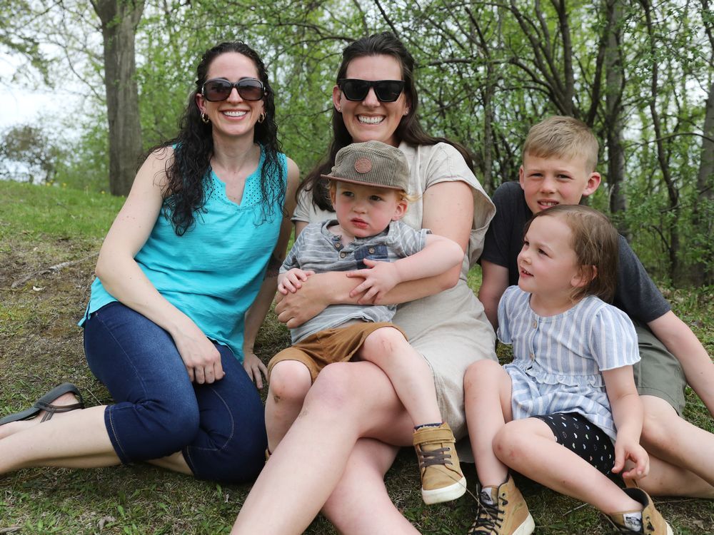 nurse sophie barrette, left, with katie cleary, van schouten, 2, willa schouten, 4, and bentley schouten, 9. barrette used cpr to save van.