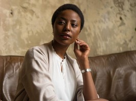 Woman sitting on couch