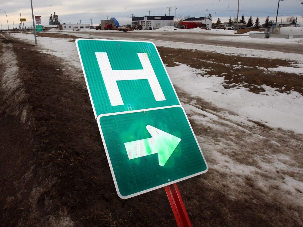 The hospital road sign on the road into Bassano. File photo.