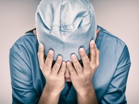 Crying doctor during needing help in hospital. Healthcare workers in despair over emergency need of PPE and distress. crisis death, dispair, mental health anxiety