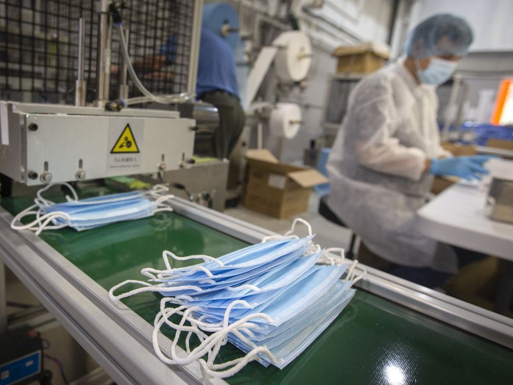 some public health authorities, including windsor-essex's top doc, feel it's time to mask up again. in this oct. 28, 2021, file photo, local workers package level 3 surgical masks at harbour technologies.