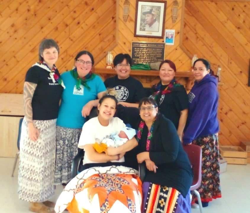 Indigenous midwives and Sturgeon Lake birth support workers joined (sitting) Ashley Rabbitskin with Kaleo Rabbitskin, Norma Rabbitskin. Back row: Natalie Pambrun, Carol Couchie, Wanita Bear, Patricia Ermine and Jocelyn Shrader. Feb 23, 2022. PHOTO SUPPLIED