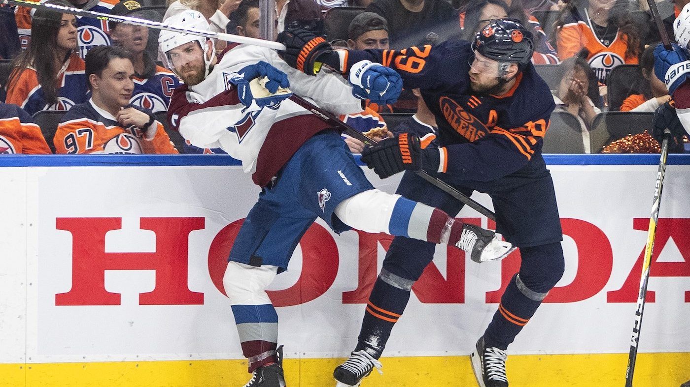 Colorado Avalanche's Devon Toews (7) is checked by Edmonton Oilers' Leon Draisaitl (29) during second period NHL conference finals action in Edmonton on Monday, June 6, 2022. THE CANADIAN PRESS/Jason Franson