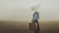 surreal moment of a woman traveler with her head covered by a cloud