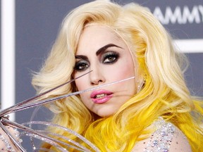 Lady Gaga poses on the red carpet at the 52nd annual Grammy Awards in 2010.