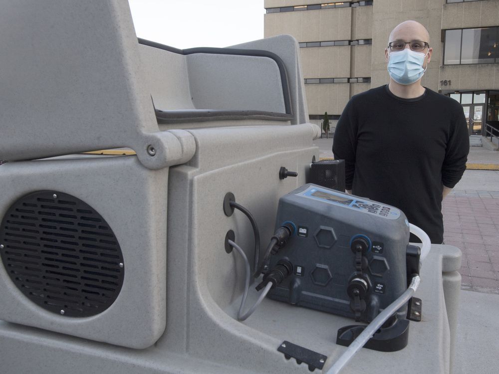 a file photo shows robert delatolla standing beside a pumping station used to collect wastewater samples that are screened for covid-19 subvariants.