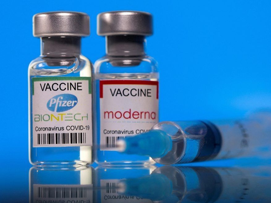 vials with pfizer-biontech and moderna coronavirus disease (covid-19) vaccine labels are seen in this illustration picture taken march 19, 2021.