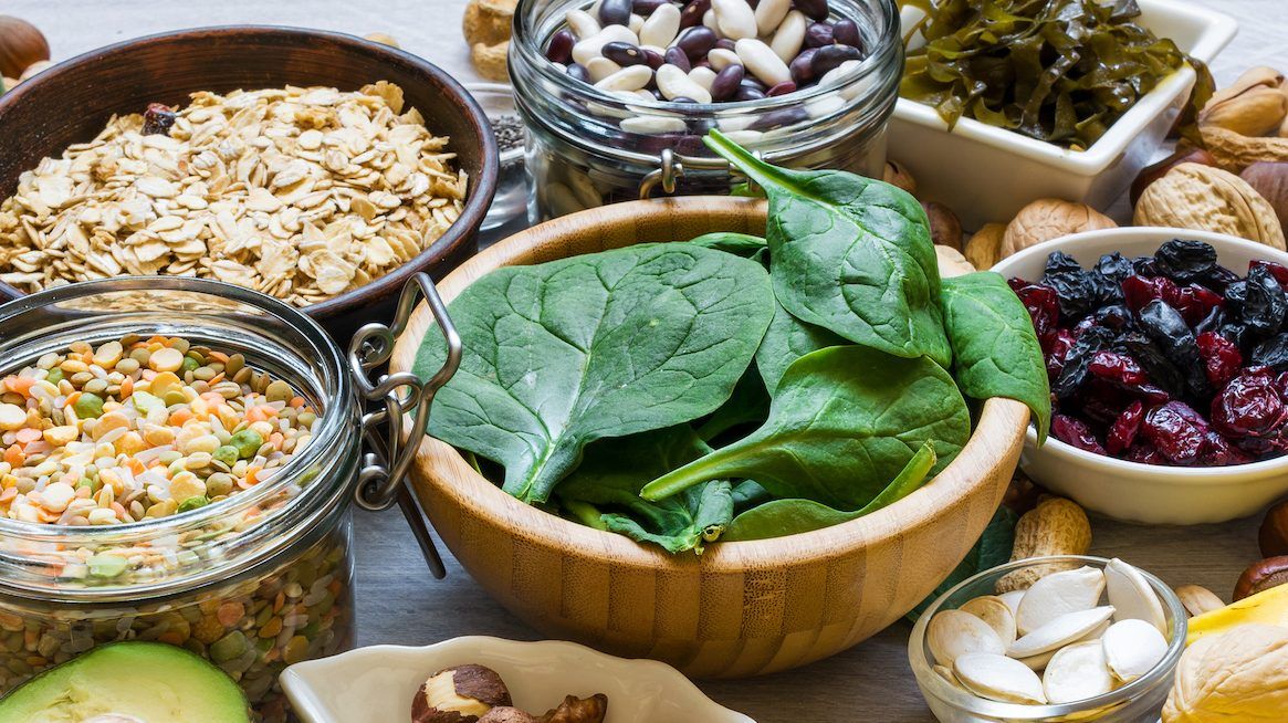 the best sources of magnesium are legumes, fish, seeds, nuts, leafy greens and whole grains. getty