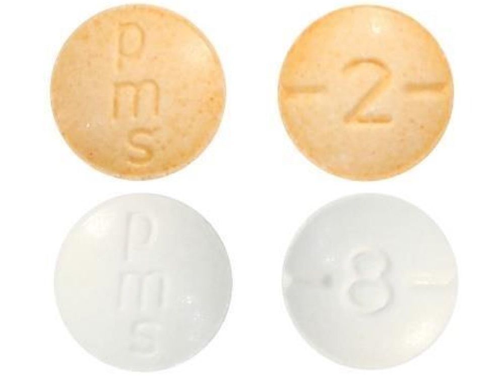 hydromorphone hydrochloride tablets in 2 mg (top) and 8 mg (bottom) versions.