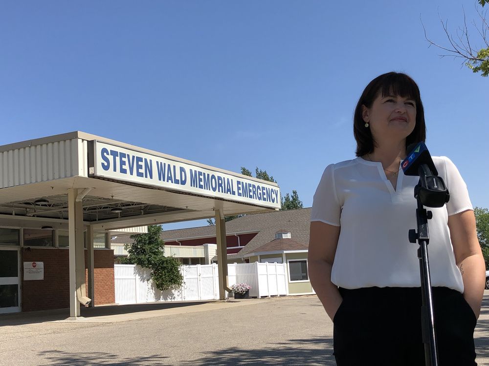 ndp leader carla beck speaks to reporters about temporary bed closures at the assiniboia hospital on tuesday.