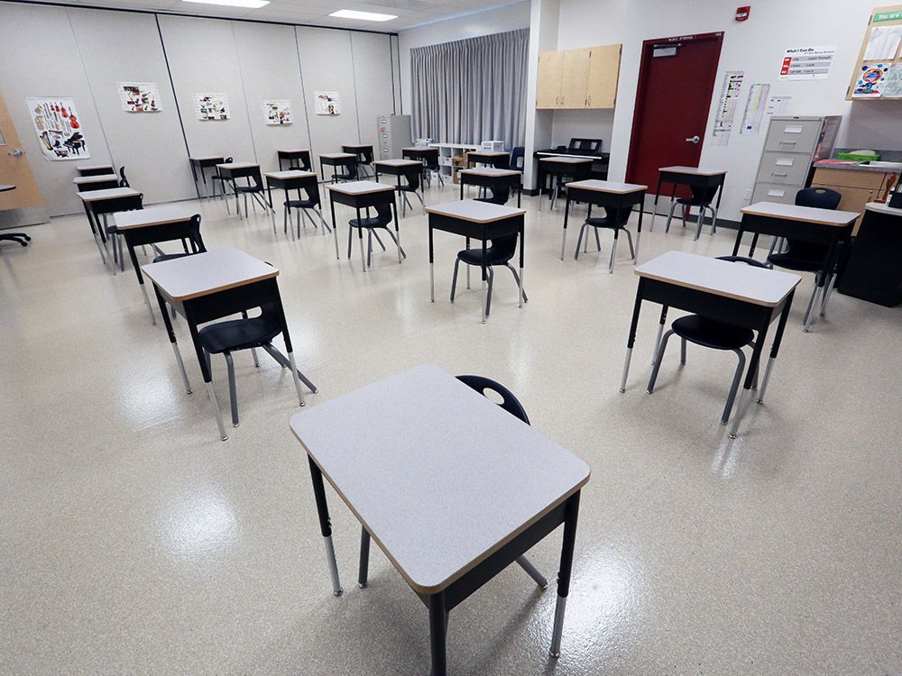 desks spaced out in a calgary classroom.