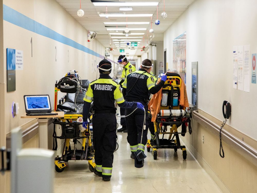 file photo: toronto paramedics deliver patients to an emergency room.