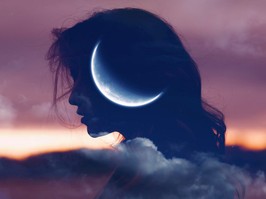 Beautiful woman profile silhouette portrait with moon in her head.