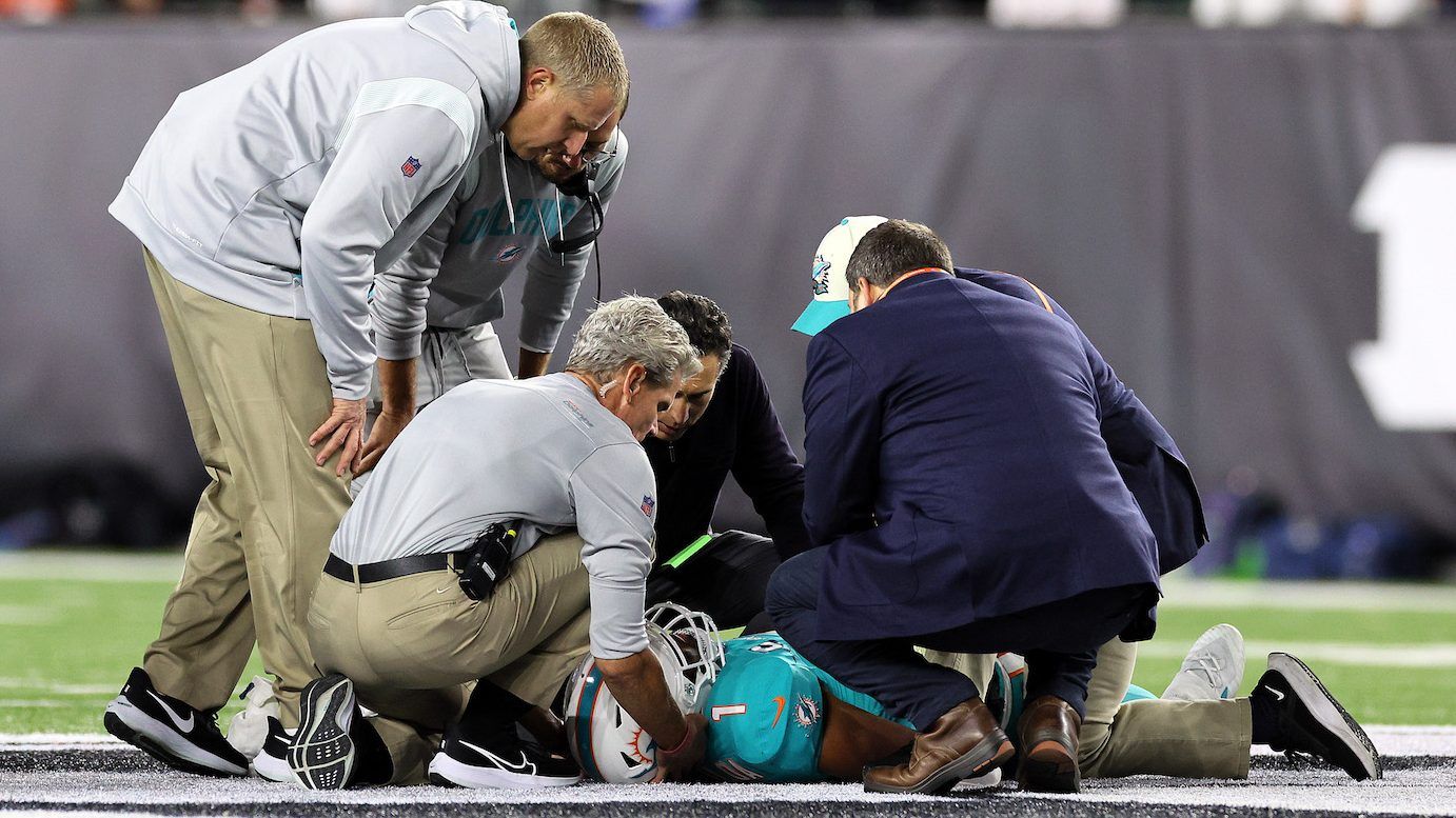 Medical staff tend to quarterback Tua Tagovailoa #1 of the Miami Dolphins after an injury during the 2nd quarter of the game against the Cincinnati Bengals. (Photo by Andy Lyons/Getty Images)