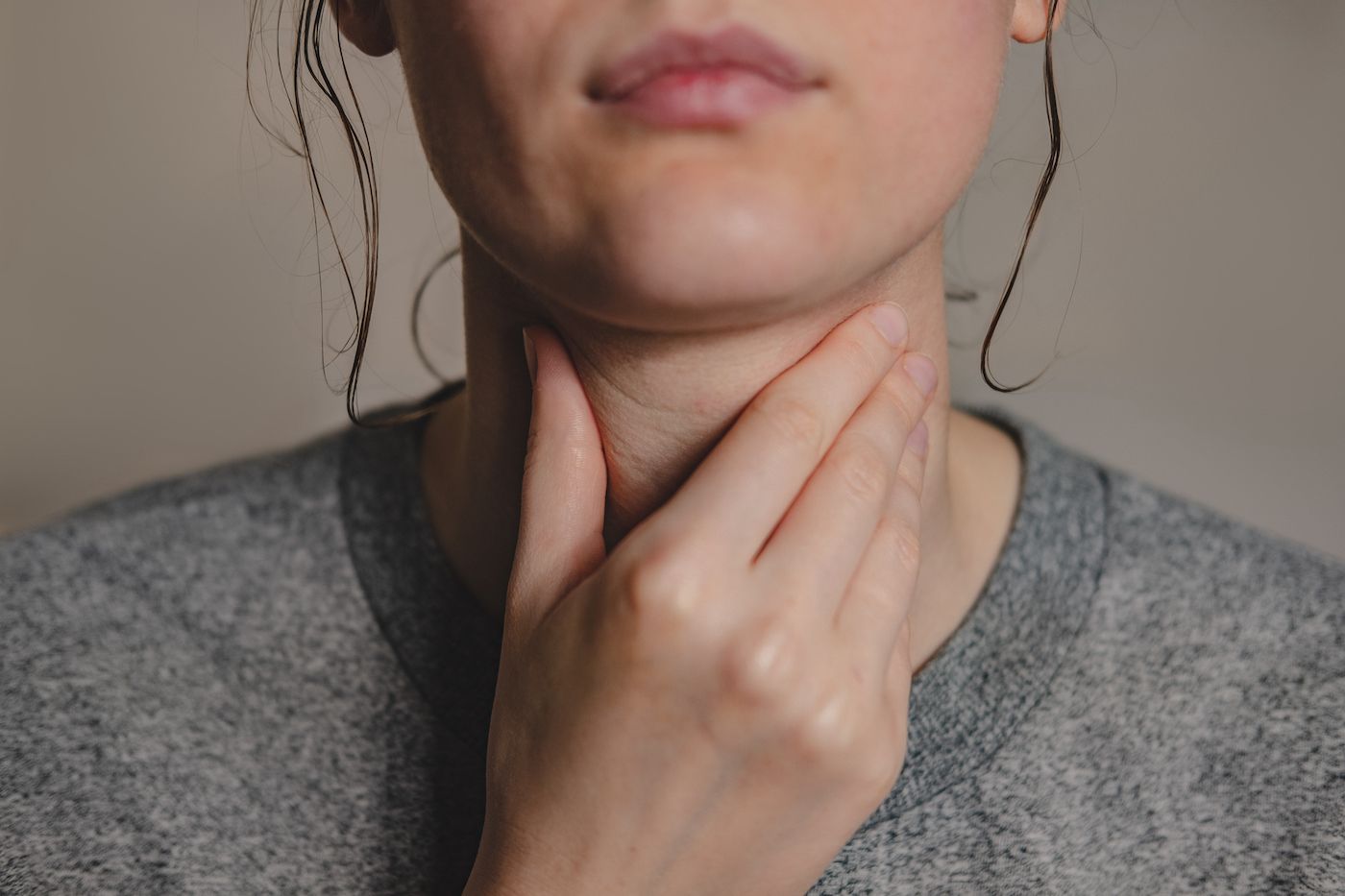 If you’ve got a sore throat, get tested for COVID-19. GETTY