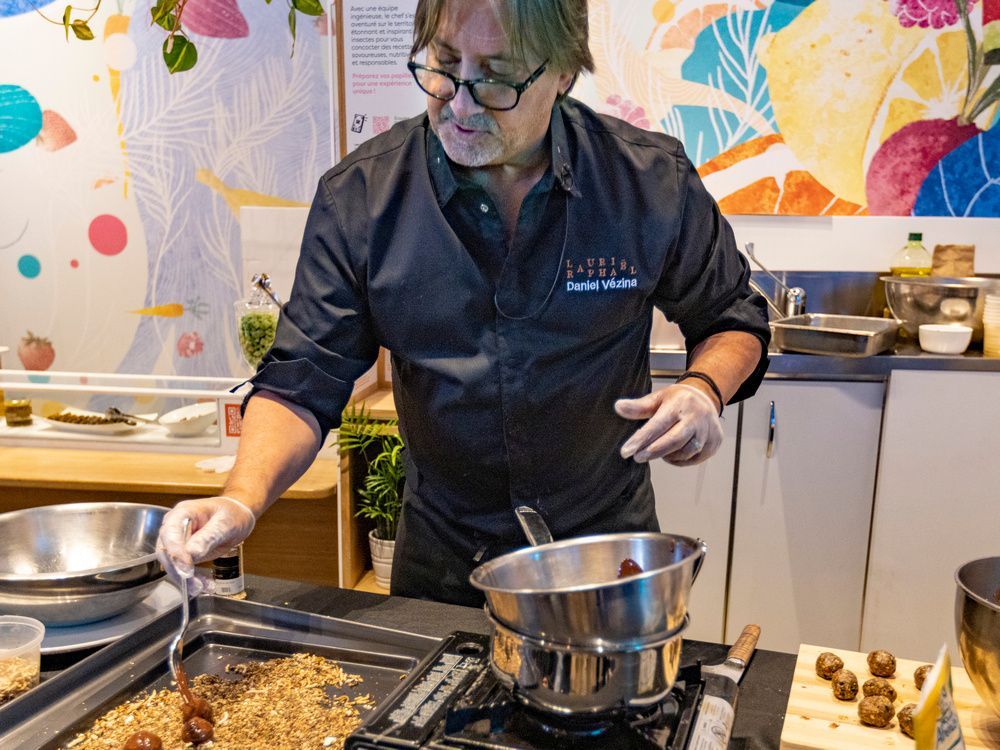 chef daniel vézina prepares energy truffles incorporating mealworms during an event in collaboration with the insectarium to get montrealers to discover the benefits of entomophilic gastronomy.