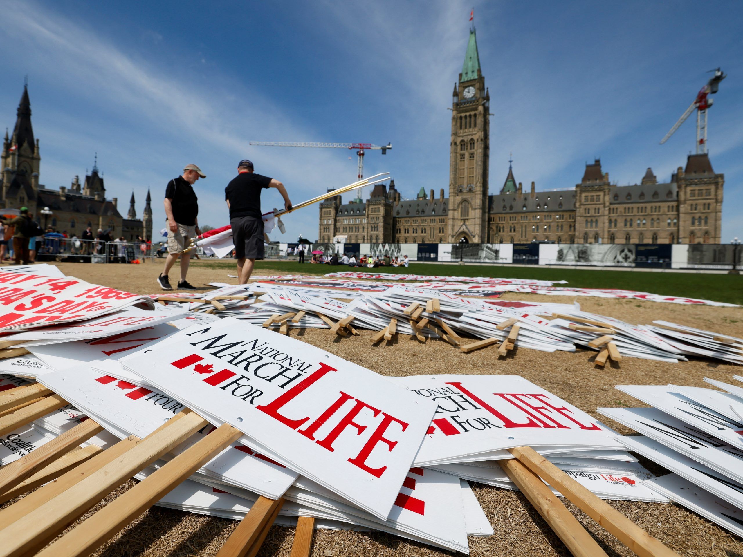 In this May photo, anti-abortion campaigners prepare for the annual National March for Life at the grounds of Parliament Hill.