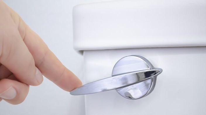 Even with the toilet lid down, germs escape into the air