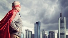senior man with red cape