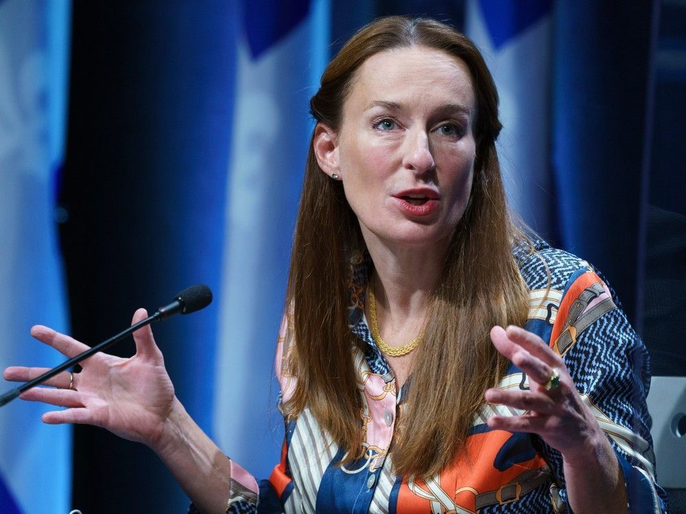 quebec deputy health minister lucie opatrny responds to a question during a news conference in montreal on wednesday, oct. 13, 2021.