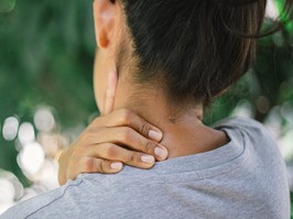 Close up young woman neck and shoulder pain and injury, Health care and medical concept