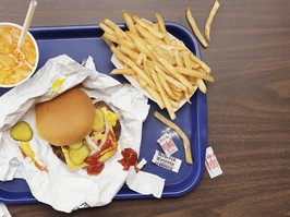 Elevated View of a Tray With Fries, a Hamburger and Lemonade