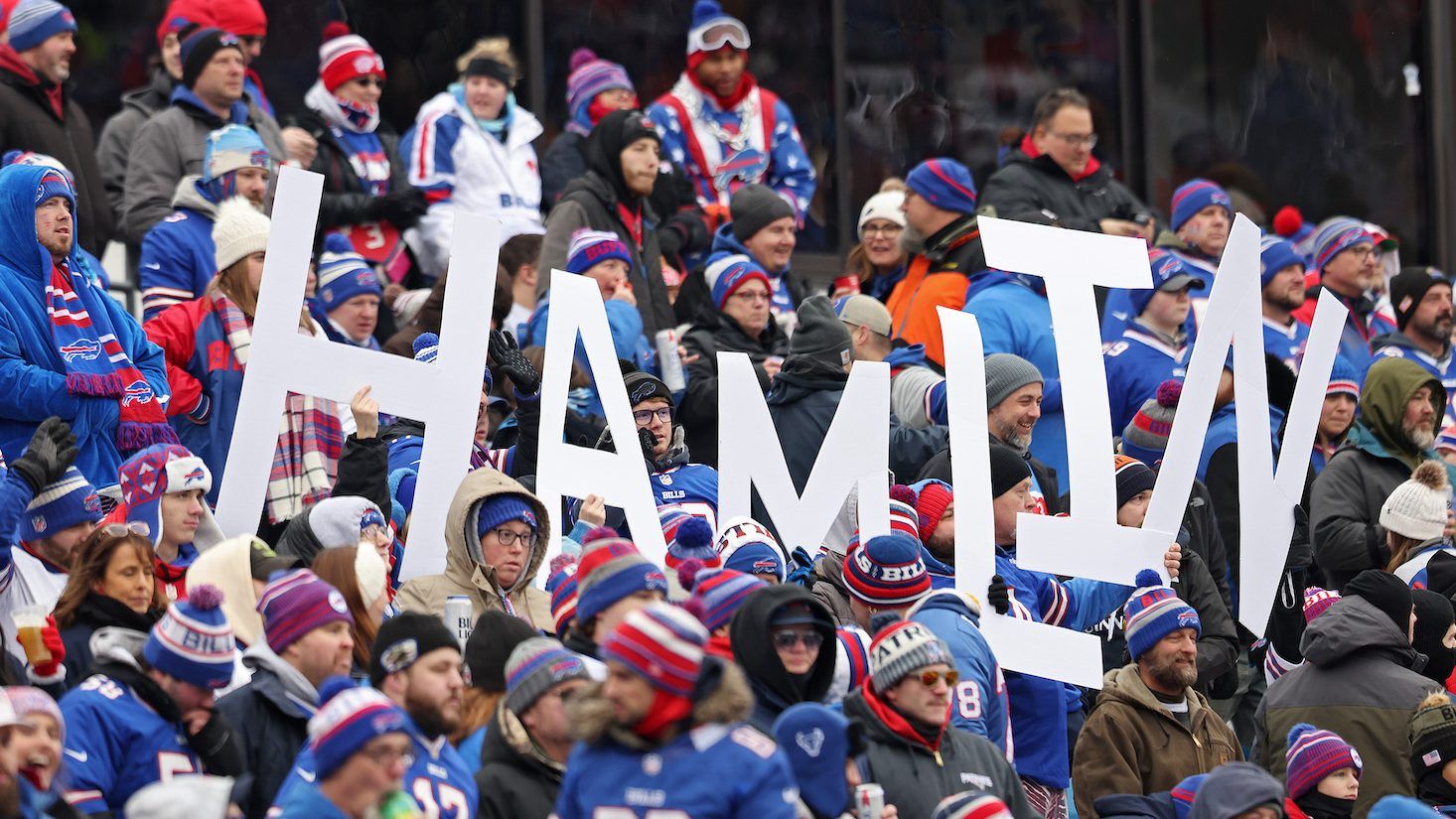 Buffalo Bills fans hold signs in support of Buffalo Bills safety Damar Hamlin during a game against the New England Patriots. (Photo by Bryan M. Bennett/Getty Images)