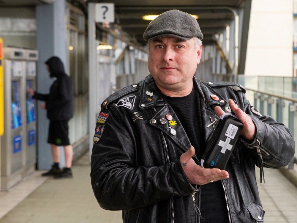 Mental health support worker Brent Morley with his naloxone kit at Sapperton Skytrain Station in New Westminster.