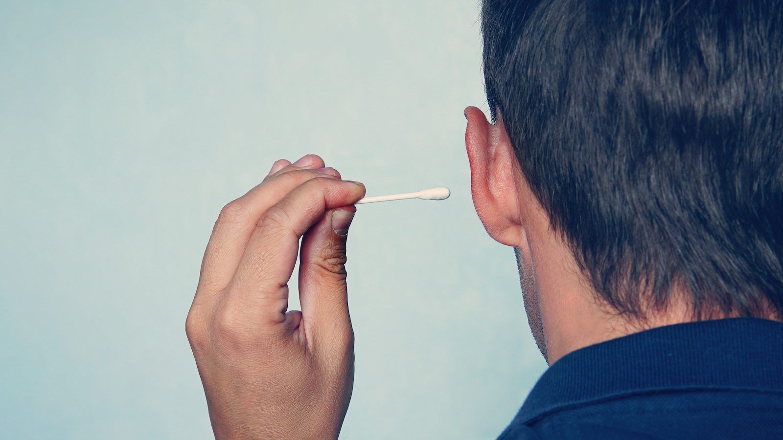 Putting a cotton swab in your ear canal can damage your ears. GETTY