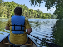 Boy on a canoe