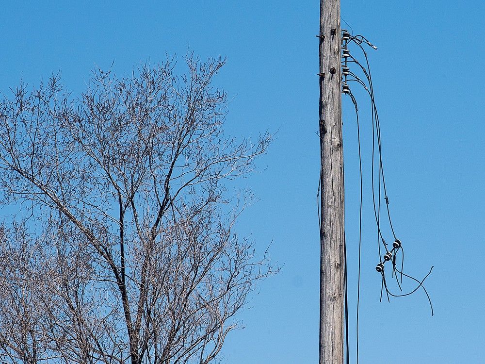 disconnected power lines are shown in montreal, sunday, april 9, 2023.