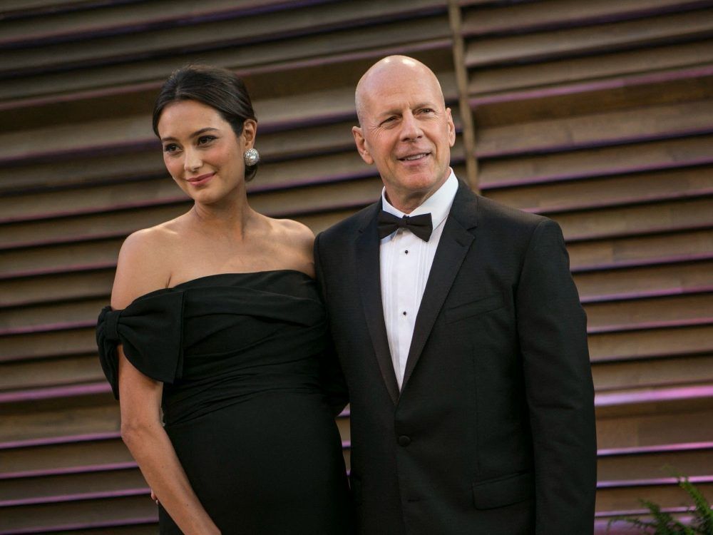 Bruce Willis and pregnant wife Emma Heming arrive to the 2014 Vanity Fair Oscar Party on March 2, 2014 in West Hollywood, California.