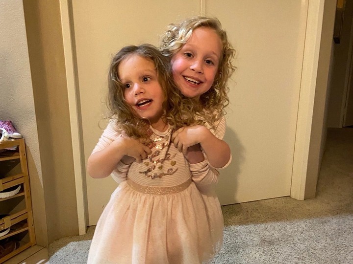  “I honestly believe that Ayla (right) was made to be Elsie’s older sibling. She is so patient and kind and there’s absolutely no sibling rivalry — she would do anything for her little sister,” says their mom, Julia. SUPPLIED