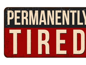 sign that says Permanently Tired