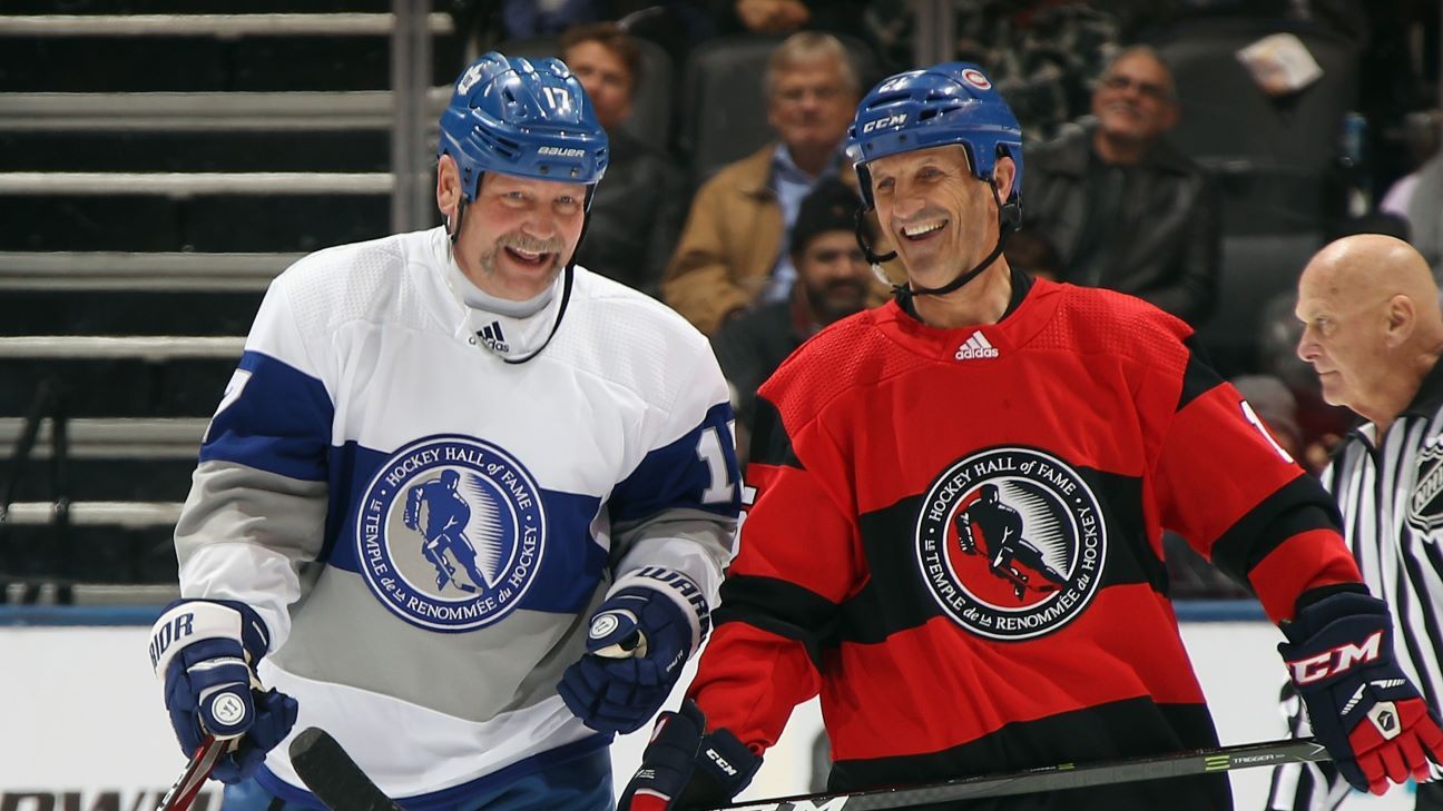 Wendel Clark and Guy Carbonneau share a laugh during the Legends Classic game at Scotiabank Arena on November 17, 2019 in Toronto, Ontario, Canada. 