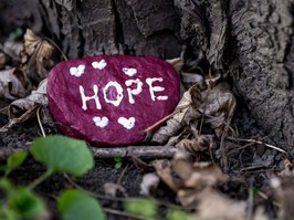 Painted rock that symbolizes hope in a cancer diagnosis