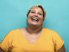 Happy plus size smiling woman portrait