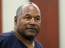 O. J. Simpson stands during a break during the second day of evidentiary hearing in Clark County District Court on May 14, 2013 in Las Vegas, Nevada. Simpson, who is currently serving a nine-to-33-year sentence in state prison as a result of his October 2008 conviction for armed robbery and kidnapping charges, is using a writ of habeas corpus to seek a new trial, claiming he had such bad representation that his conviction should be reversed. REUTERS/Steve Marcus/pool
