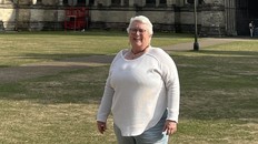 Carla Heggie posing for a photo outside the Salisbury Cathedral