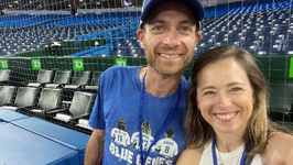 connor and jen at a toronto blue jays game.