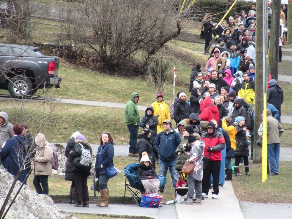 hundreds of people line up on montreal street outside a kingston family health clinic in hopes of becoming rostered for a family doctor at cdk family medicine in kingston, ont. on wednesday, feb. 29, 2024.