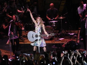Taylor Swift is planning to release a CD/DVD package on Nov. 21.
