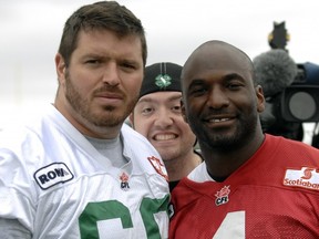 That's a smiling Chris Milo between C Dominic Picard and Darian Durant (4)  after a recent practice (BRYAN SCHLOSSER/ Regina Leader-Post.)