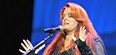 Wynonna Judd, shown here performing at the Ryman Auditorium in Nashville in June, opened her Christmas tour Tuesday in Regina. Erika Goldring/Getty Images